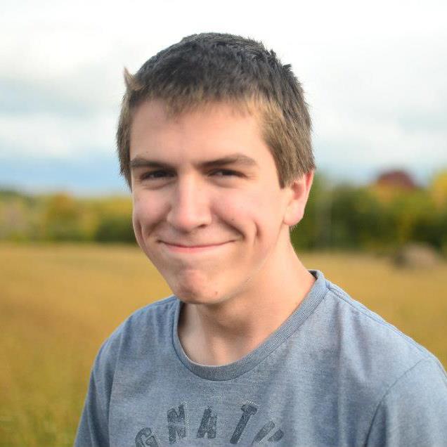 Young man with prominent facial dimples